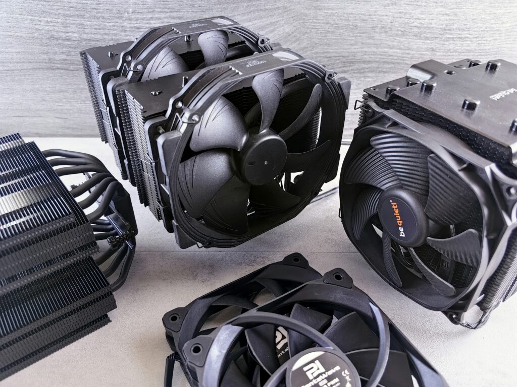 best low profile cpu cooler showing Noctua NH-L9a-AM5 and Thermalright AXP120-X67 compact coolers side by side for small form factor Mini-ITX PC builds