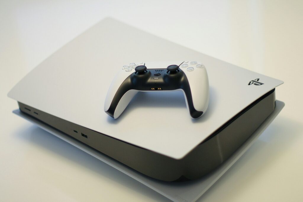 ps5 120hz games showing PS5 console connected to TV with 120Hz settings menu representing PS5 specs 4K 120Hz games list WiFi 6 HDMI 2.1 backwards compatibility power draw and PS5 technical specifications