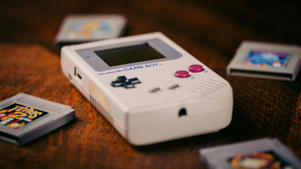retro handheld game system showing Miyoo Mini Plus Retroid Pocket 5 and Anbernic RG353M representing best retro handheld game systems 2026 emulator consoles compatibility table how to set up and which device plays which games