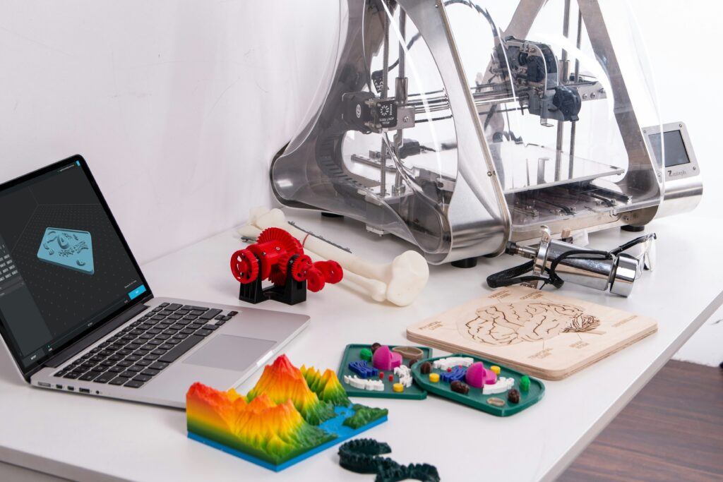 how much does 3d printing cost showing a calculator next to a 3d printer and filament spool representing the cost breakdown of 3d printing per print and per hour