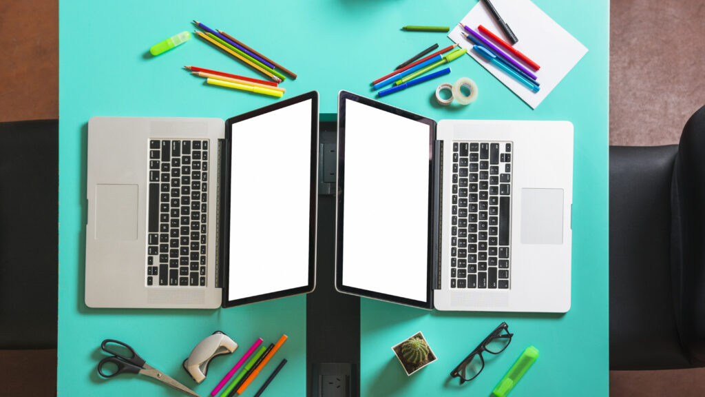 best MacBook for college showing MacBook Air M4 on a desk with textbooks representing best MacBook for students 2026 MacBook Air vs Pro 256GB vs 512GB and college buying guide