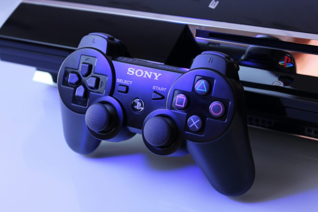 PlayStation meaning symbol slogan logo history guide showing PlayStation controller with symbols representing meaning of playstation symbol slogan logo PS3 store PS4 end of life brand history guide