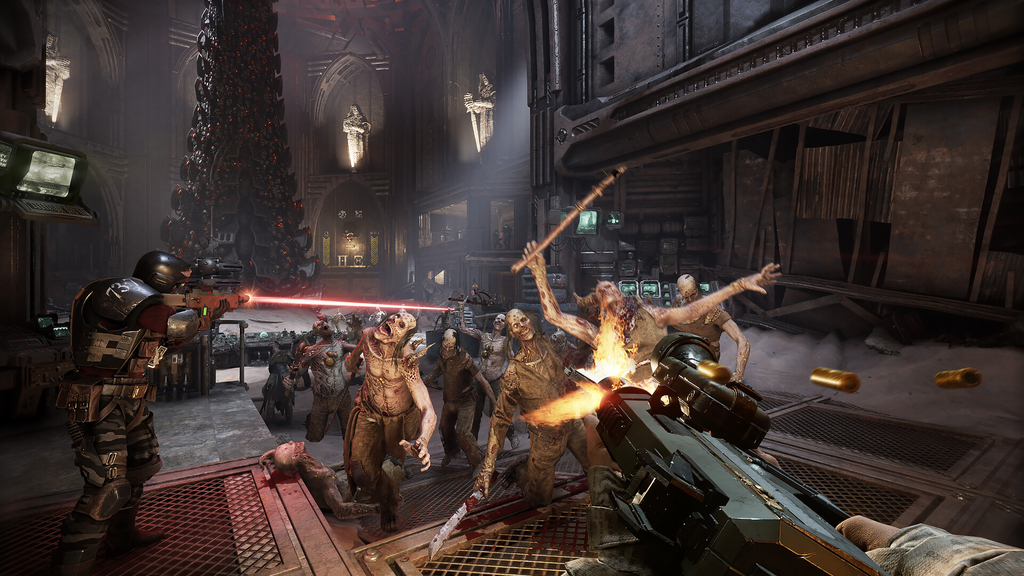 Warhammer 40K Darktide squad fighting a horde of infected cultists in a gothic hive city corridor